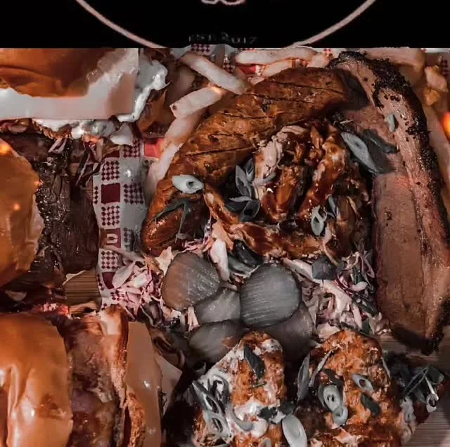 Southwest Barbecue mixed feast with brisket, burgers and smoked meats